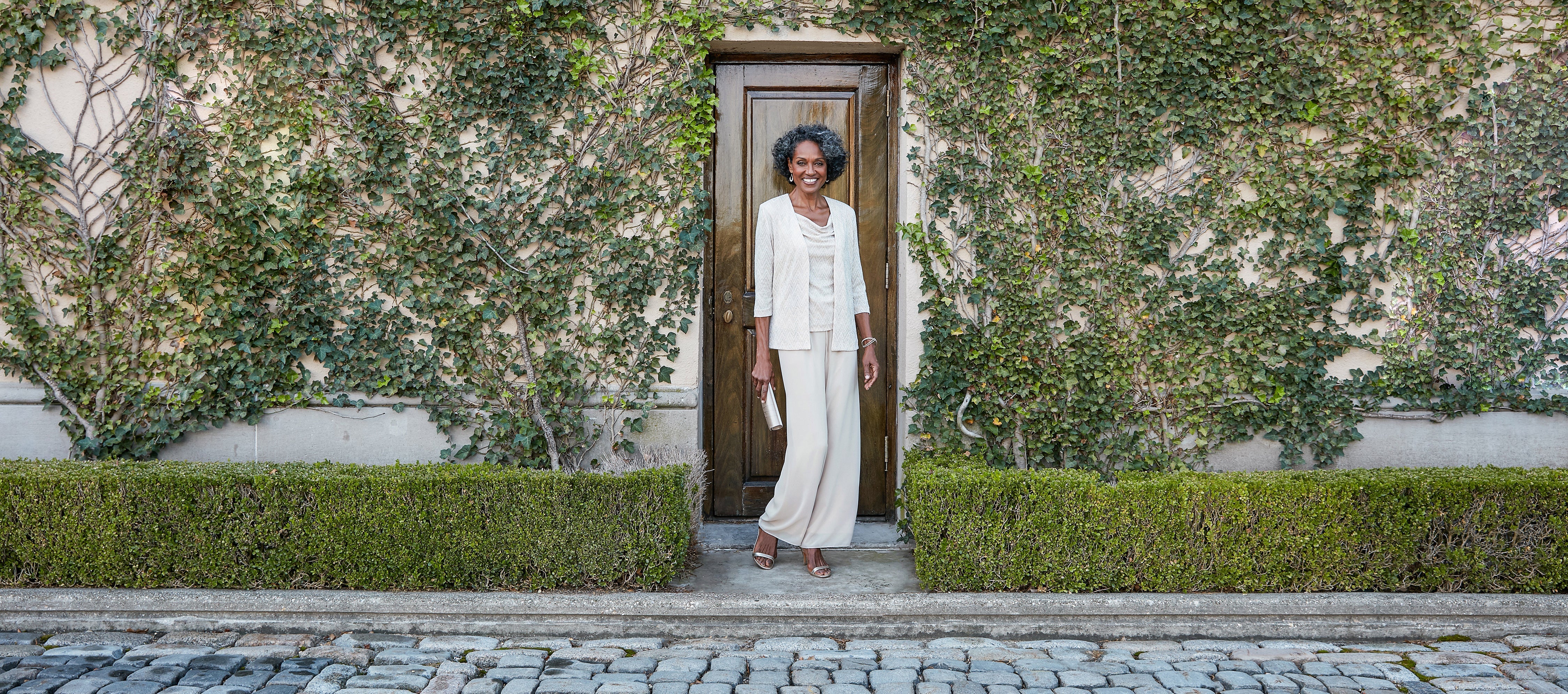 woman in taupe outfit