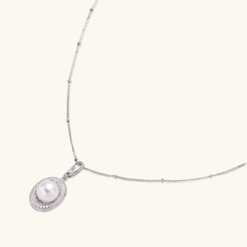Sterling silver necklace with freshwater pearl in sparkling crystal halo pendant on delicate beaded chain