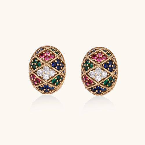 Oval gold-plated stud earrings with multicolor zirconia stones in geometric diamond pattern on white background.