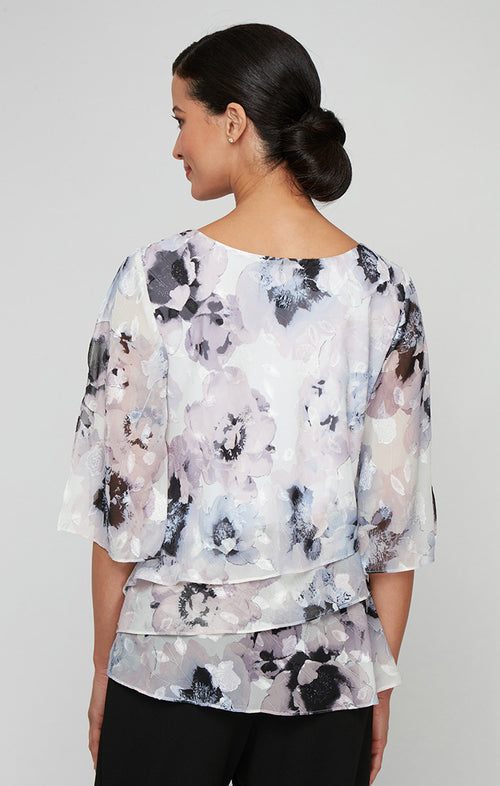 Plus Printed Chiffon Burnout Blouse with Asymmetric Tier Hem Detail and Embellished Cutout Neckline