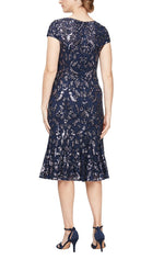 Midi Length Sequin Fit and Flare Dress with Illusion Neckline, Cap Sleeves and Flounce Hem Detail - alexevenings.com